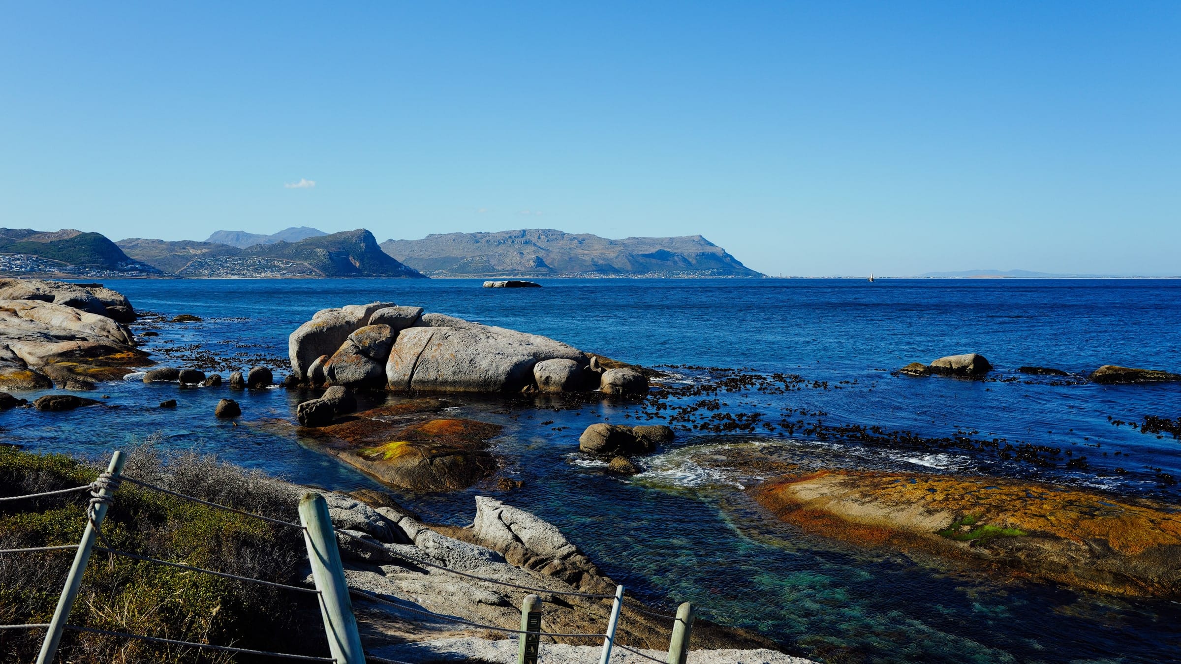 The Cape peninsula coastline dropping to the Atlantic in late afternoon light